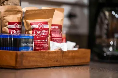 a wooden container filled with peanut butter and other food items at Hilltop 3BR for 10, Private Garage, Skyline Views in Covington