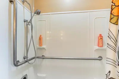a shower in a bathroom with a shower curtain at Less Than 1 Mi to Dtwn Tiffin Home with Outdoor Space! in Tiffin
