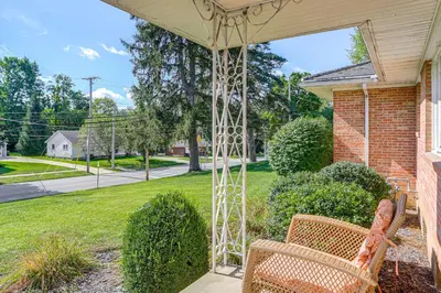 a porch with two chairs and a gazebo at Less Than 1 Mi to Dtwn Tiffin Home with Outdoor Space! in Tiffin