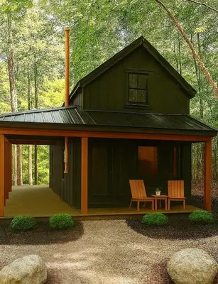 a cabin in the woods with two chairs on the porch at Lux Tiny House with Waterfront, Kayaks, Hot Tub, Arcade in Rockbridge