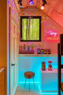 a dressing room with a table and a stool at Lux Tiny House with Waterfront, Kayaks, Hot Tub, Arcade in Rockbridge