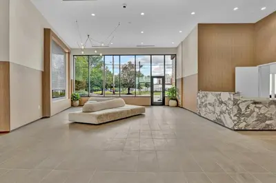 a large living room with a couch in the middle at Stay in Cleveland mins to Cleveland Clinic, Hospitals, Museum, Universities & Downtown in Cleveland