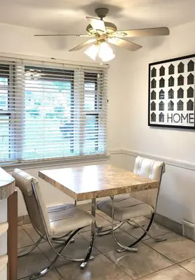 a dining room with a table and chairs at Your Home Away from Home Sleeps 12 Fully Equipped in Youngstown