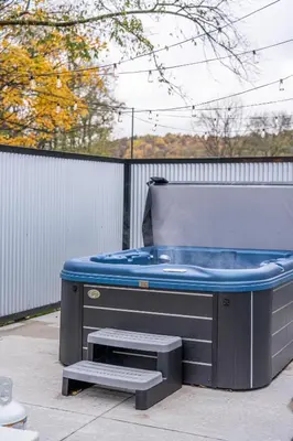 a jacuzzi tub sitting on a patio at Swancrest in Killbuck