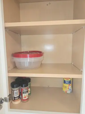 a pantry with a bowl and a container of food at Townhouse at 99 in Boardman