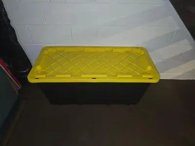 a yellow tray sitting on top of a shelf at Townhouse at 99 in Boardman