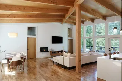a living room with a couch and a table at The Hollow House in McArthur