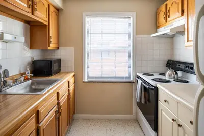 a kitchen with a sink and a stove at Pet-Friendly Serenity Spot on Dorthy Lane in Dayton