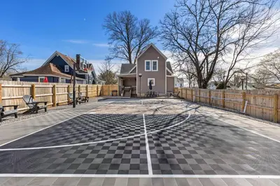 a basketball court in front of a house at The Luxe/Pickleball/Basketball/ Hot Tub/Horse Park in Georgetown