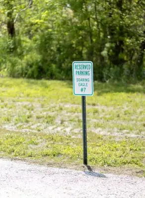 a sign that is on the side of a road at Glamping Tent/Red River Access/2 Queen Beds in Stanton