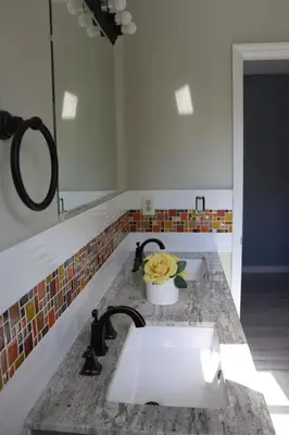 a bathroom counter with two sinks and a mirror at Cozy Meets Luxury in Tylersville