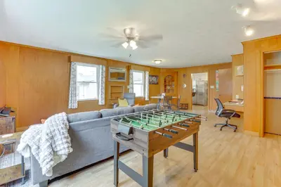 a living room with a couch and a table at 4 Mi to Main Street! Family Getaway in Zanesville in Zanesville