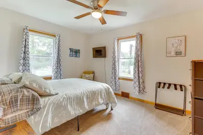 a bedroom with a bed and a ceiling fan at 4 Mi to Main Street! Family Getaway in Zanesville in Zanesville