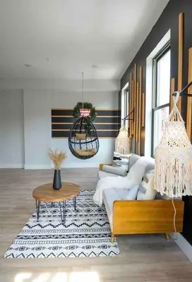 a living room with a couch and a table at OTR by TQL+King Bed+Light Rail+Dedicated Parking in Cincinnati
