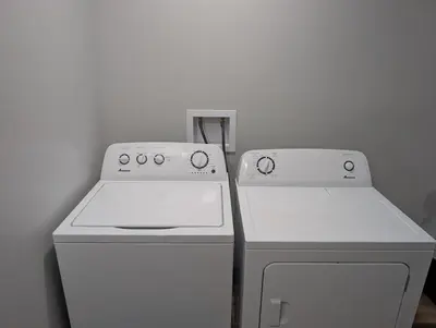 two white stove and a refrigerator in a kitchen at Little house on the prairie