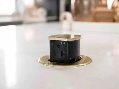 a small black object sitting on top of a table at New Build, Downtown Views, next to NCH in Columbus