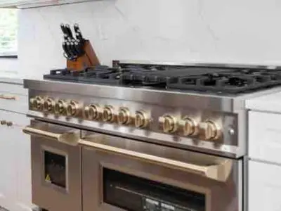 a stainless steel stove top oven in a kitchen at Brand NEW Build, D-Town Views, must See in Columbus