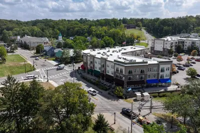 an aerial view of a city with a building at 1 Block to Loveland Bike Trail The Frog Man Inn in Loveland
