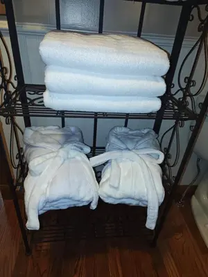 two towels on a towel rack in a room at Pointer Palace in South Point