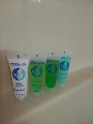 a group of four bottles of lotion on a shelf at Pointer Palace in South Point