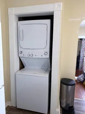 a microwave sitting on top of a refrigerator at The Riverstone Getaway in historical Madison, IN in Madison