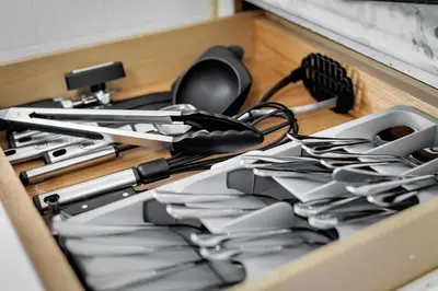 a drawer filled with lots of utensils at Group Suite in Tremont, 4 TV's, Pet Friendly in Cleveland
