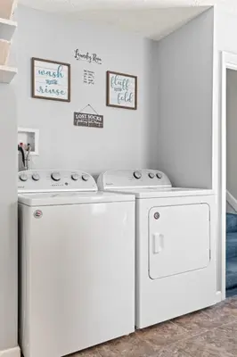 two whitewashes in a room with a kitchen at Ohio City 4 Bed 3 TV Free Parking Mins to DT in Cleveland