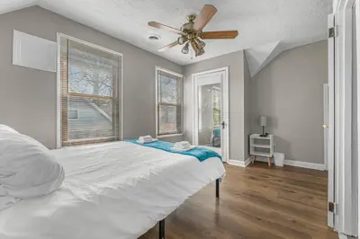 a bedroom with a bed and a ceiling fan at Luxe Mattresses Pet Friendly Free Prkng WiFi in Cleveland