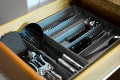 a drawer in a kitchen with utensils in it at Little Italy Group Stay 4 TV's Pet Friendly in Cleveland