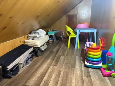 a room with a bed and a table and chairs at Westdale in Cleveland