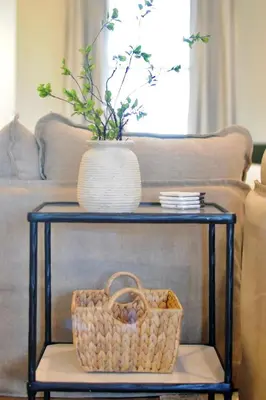 a console table with a basket and a vase on it at Country Comfort with Pool Family & Groups in Dundee