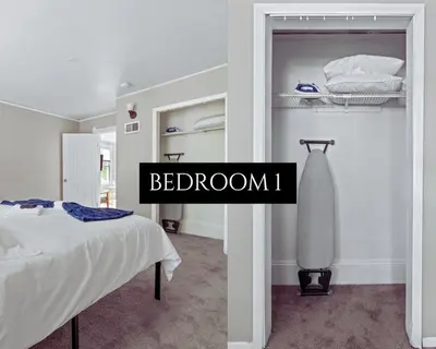 a bedroom with a bed and a room with a bed gmaxwell at Ohio City KING Bed Free Parking Pet Friendly in Cleveland