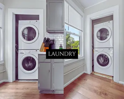 a laundry room with three washing machines in it at Ohio City KING Bed Free Parking Pet Friendly in Cleveland