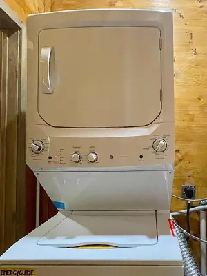 a microwave oven sitting on top of a stove at Hillside Haven in Warsaw