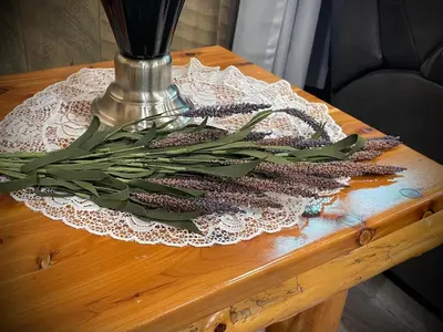 a table with a lace doily on top at Hillside Haven in Warsaw
