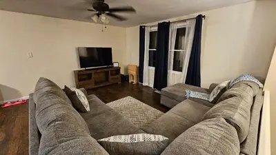 a living room with a couch and a flat screen tv at 3 BDR - Your Perfect Getaway! in Warren
