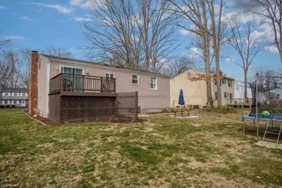 a house with a deck and a yard at 3 BDR - Your Perfect Getaway! in Warren