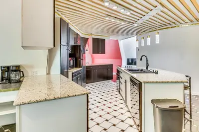 a kitchen with a sink and a counter top at Walk to School House Winery Home with Deck! in Dover