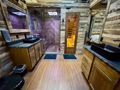 a bathroom with two sinks and a shower at Lake Therapy at The ARK | Gameroom, Hot Tub, Dock in Williamstown