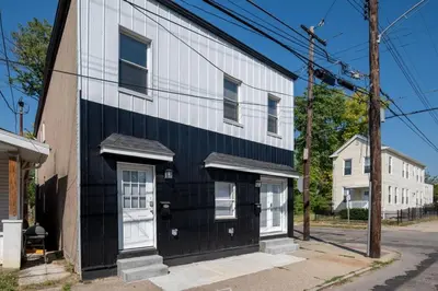 a black and white building on a street at Walnut Hills, 5min to UC, Sleeps 7ppl, Lux Beds, Smart TVs in Cincinnati