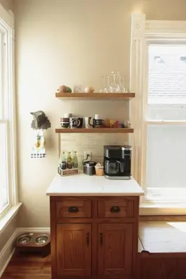 a kitchen with a counter with a coffee maker on it at 1880s Georgetown Jewel in Georgetown