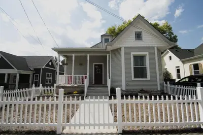 a white picket fence in front of a house at 1880s Georgetown Jewel in Georgetown