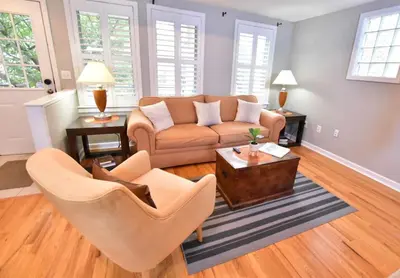a living room with a couch and chairs at Large 4 bedroom Tremont House - Bonus apartment included! in Cleveland