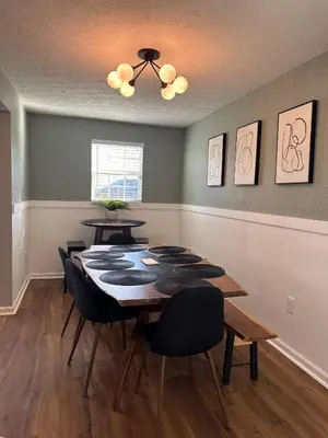 a dining room with a table and chairs at 5BR/3BA*Game Room*FirePit*Theater*3 mins to ARK! in Williamstown