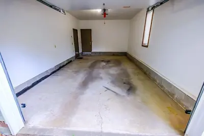 an empty room with a concrete floor at Great Price, Great Location in Canton