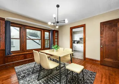 a dining room with a table and chairs at RocknRoll Crib 8 Min Cle Clinic Near Downtown in Cleveland