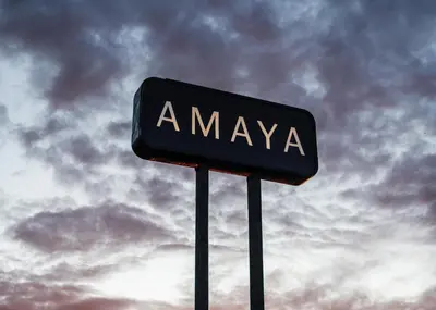 a sign that says amaya in front of a cloudy sky at The Amaya - 21 and older only in Fort Wayne