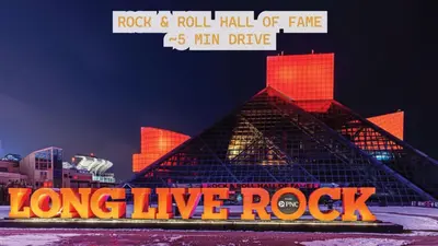 a long live rock sign in front of a building at Spacious Loft with Fireplace - near CSU, Playhouse, Progressive field, R&R Hall of Fame with Gym & Sauna and Sleeps 12 in Cleveland