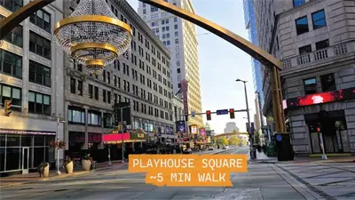a sign for a playhouse square on a city street at Spacious Loft with Fireplace - near CSU, Playhouse, Progressive field, R&R Hall of Fame with Gym & Sauna and Sleeps 12 in Cleveland