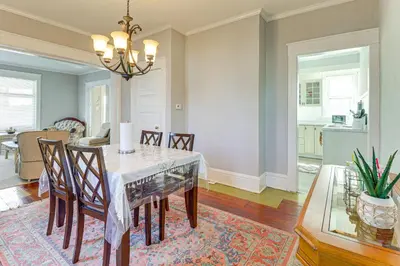 a dining room with a table and chairs at 1 Mi to Dtwn and Franciscan University Home with Yard in Steubenville